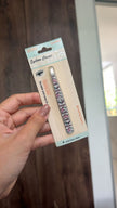 pinza depiladora de cejas
